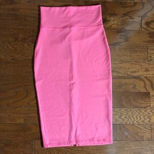 BEBE bandage skirt with slit in back. Brand new!